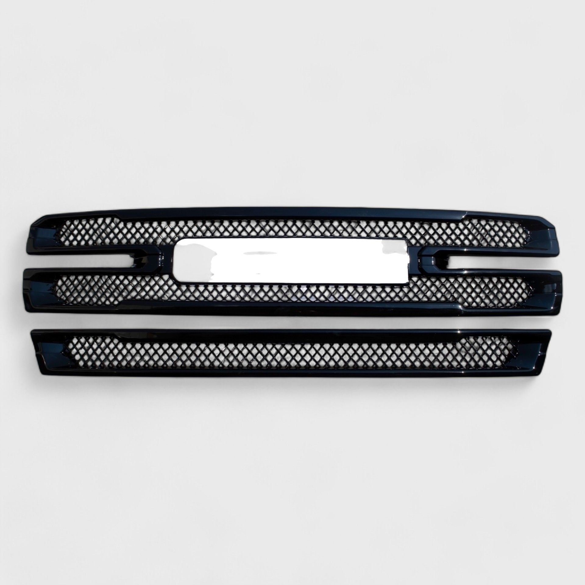 19-21 GMC Sierra 1500 AT4/SLT 2 Piece Gloss Black Tape-on Grille Overlay
